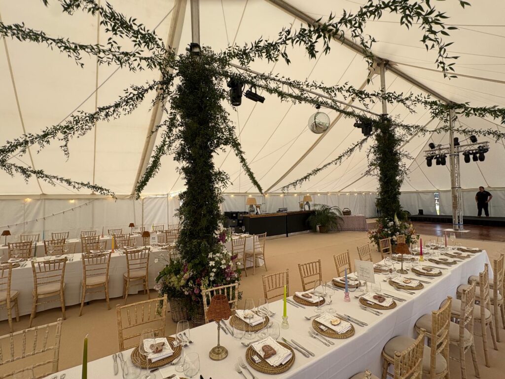 inside wedding marquee with trees